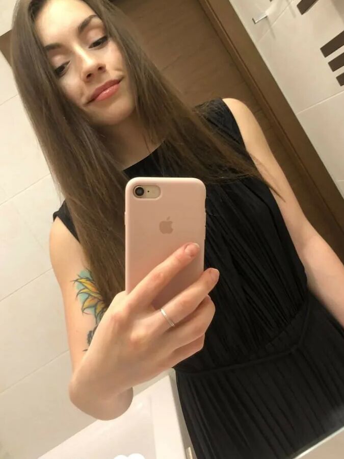 Gorgeous brunette with a tattoo loves to tease