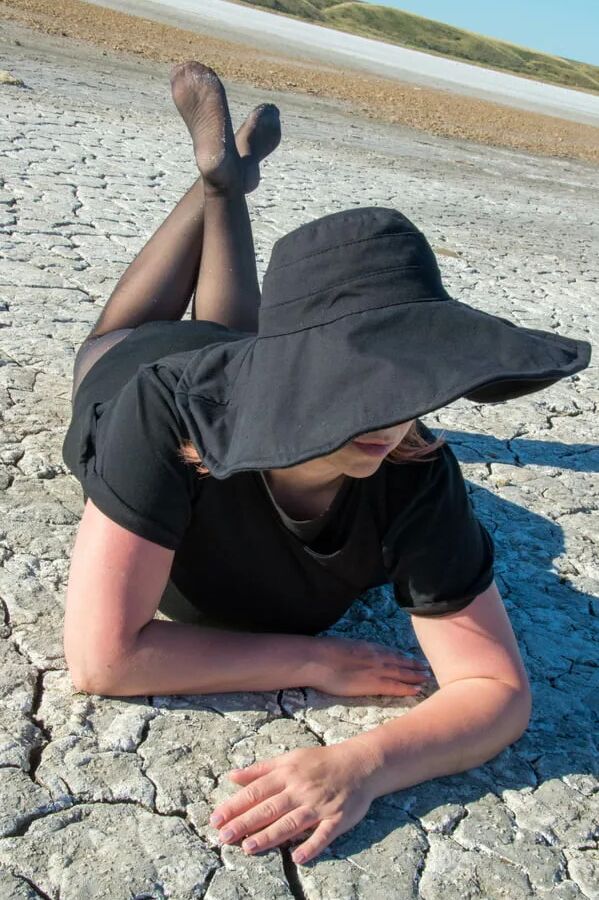 Torn and dirty feet in pantyhose outdoor