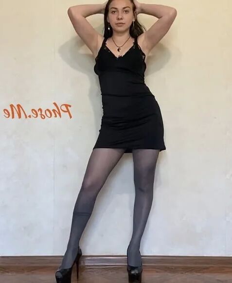 Amber In Black Dress and Grey Pantyhose and High Heels