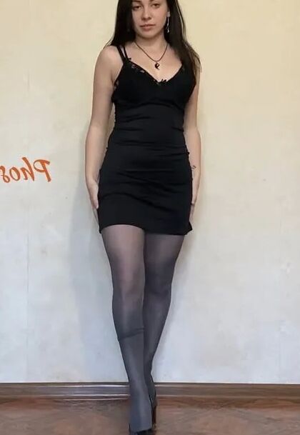 Amber In Black Dress and Grey Pantyhose and High Heels