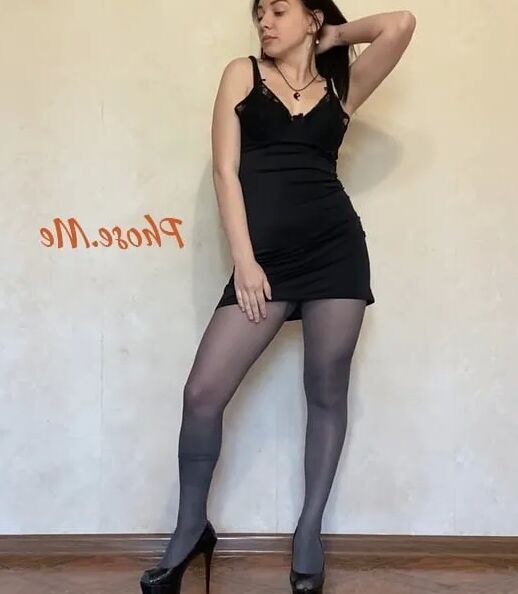 Amber In Black Dress and Grey Pantyhose and High Heels