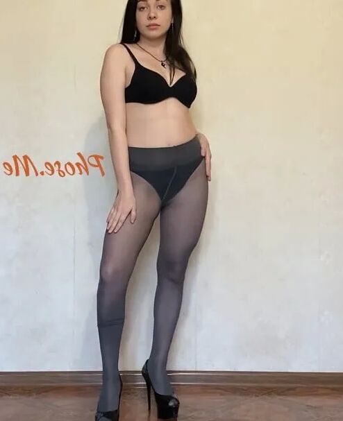 Amber In Black Dress and Grey Pantyhose and High Heels