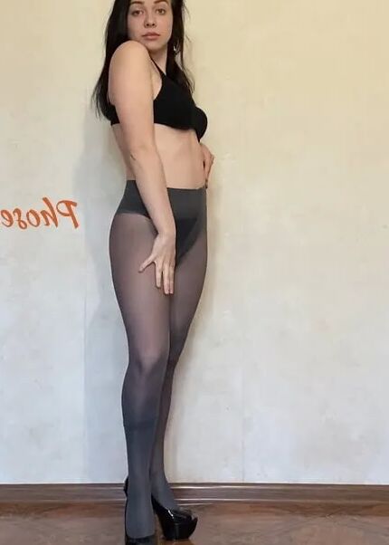 Amber In Black Dress and Grey Pantyhose and High Heels