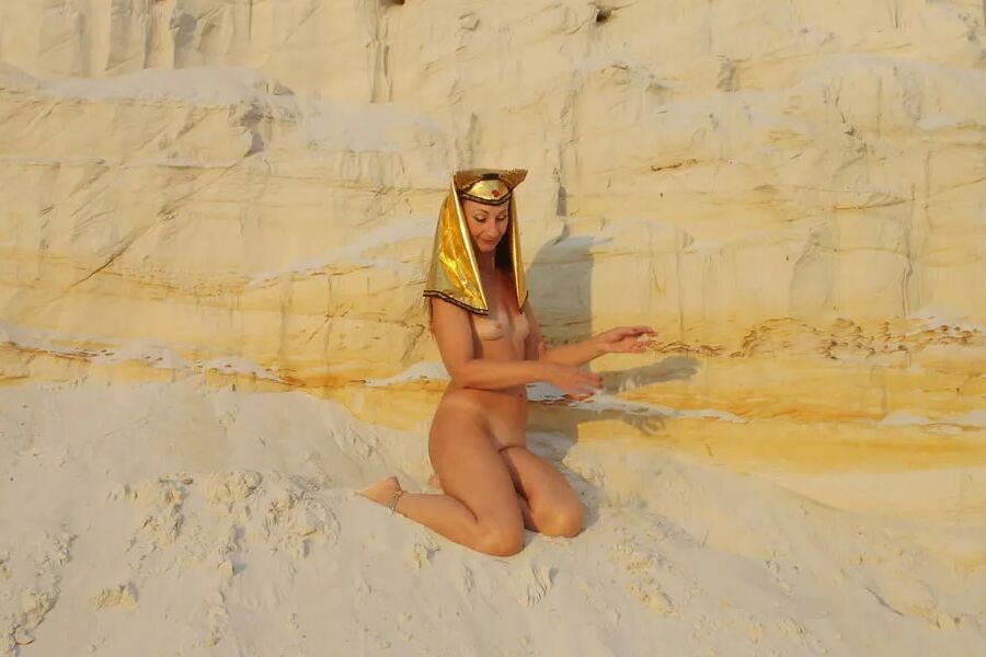 Posing Naked on White Sand in Sunset Time