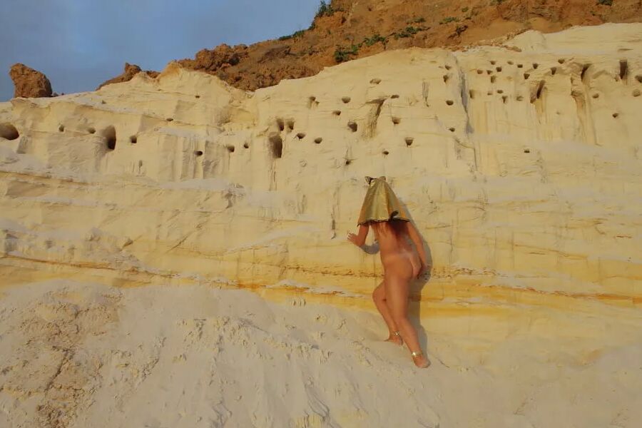Posing Naked on White Sand in Sunset Time