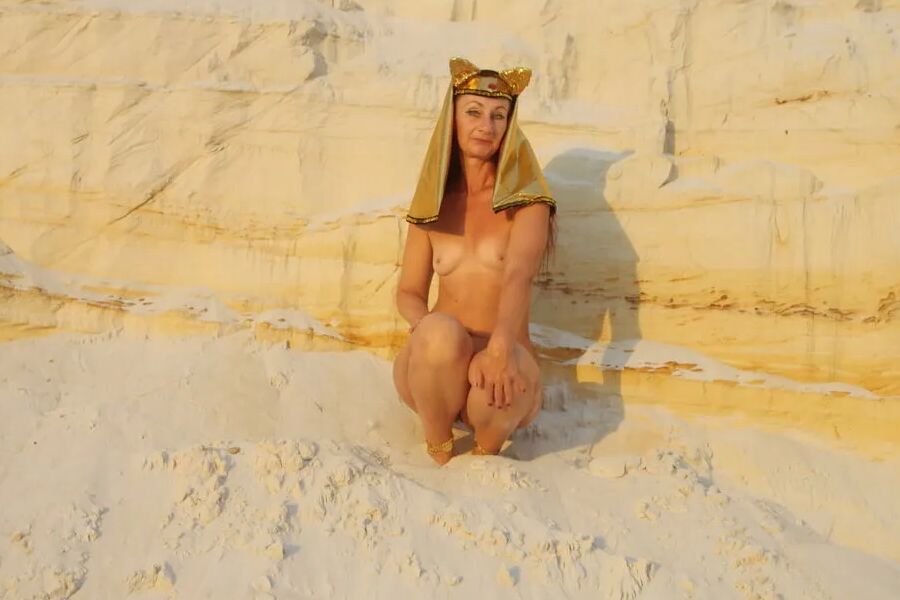 Posing Naked on White Sand in Sunset Time
