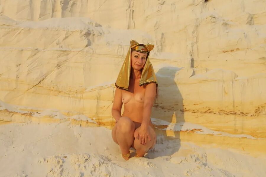Posing Naked on White Sand in Sunset Time