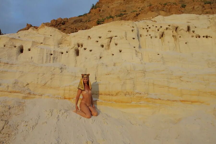 Posing Naked on White Sand in Sunset Time