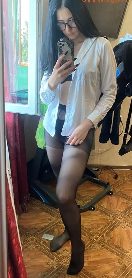 Nerdy Brunette Babe Michelle In Pantyhose Taking Selfies