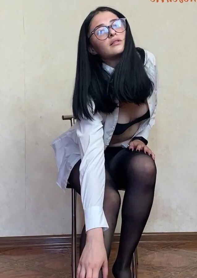 Nerdy Brunette Babe Michelle In Pantyhose Taking Selfies