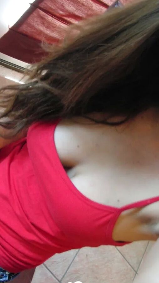 Brunette cutie gets some cum over herself