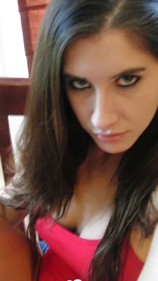 Brunette cutie gets some cum over herself