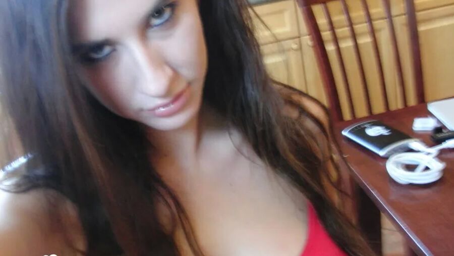 Brunette cutie gets some cum over herself