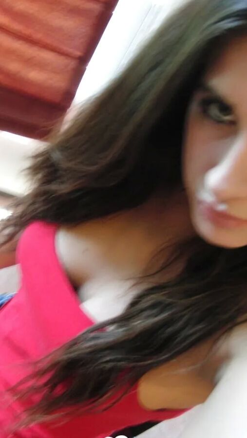 Brunette cutie gets some cum over herself