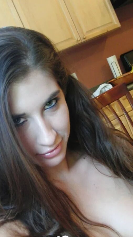 Brunette cutie gets some cum over herself