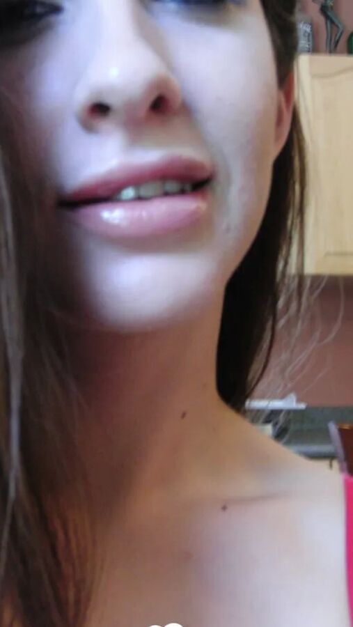 Brunette cutie gets some cum over herself