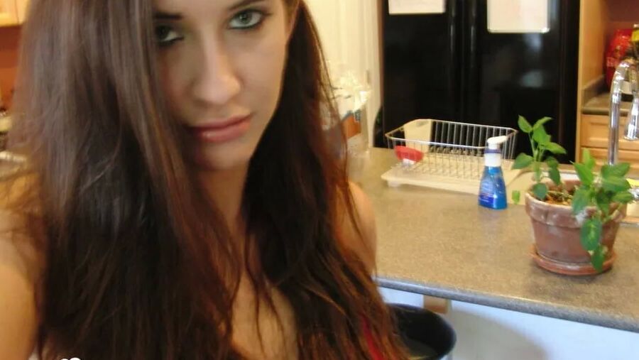 Brunette cutie gets some cum over herself