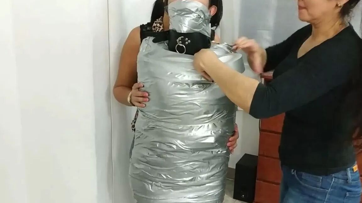Heavily Duct Tape Mummified By Crazy Bondage Women