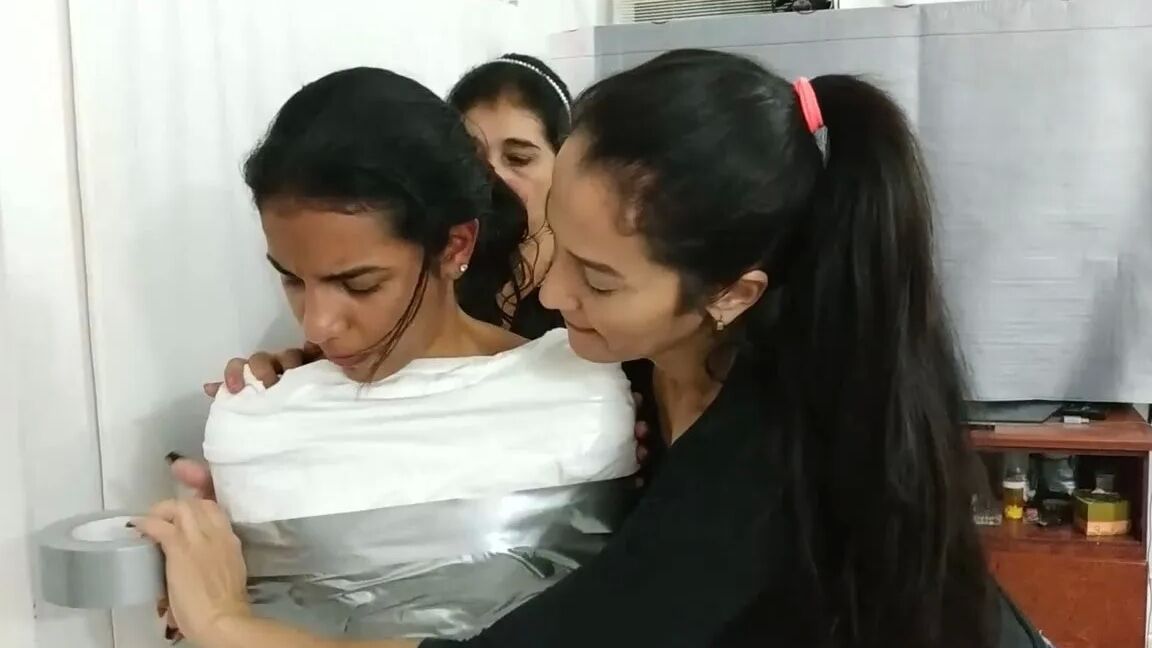 Heavily Duct Tape Mummified By Crazy Bondage Women