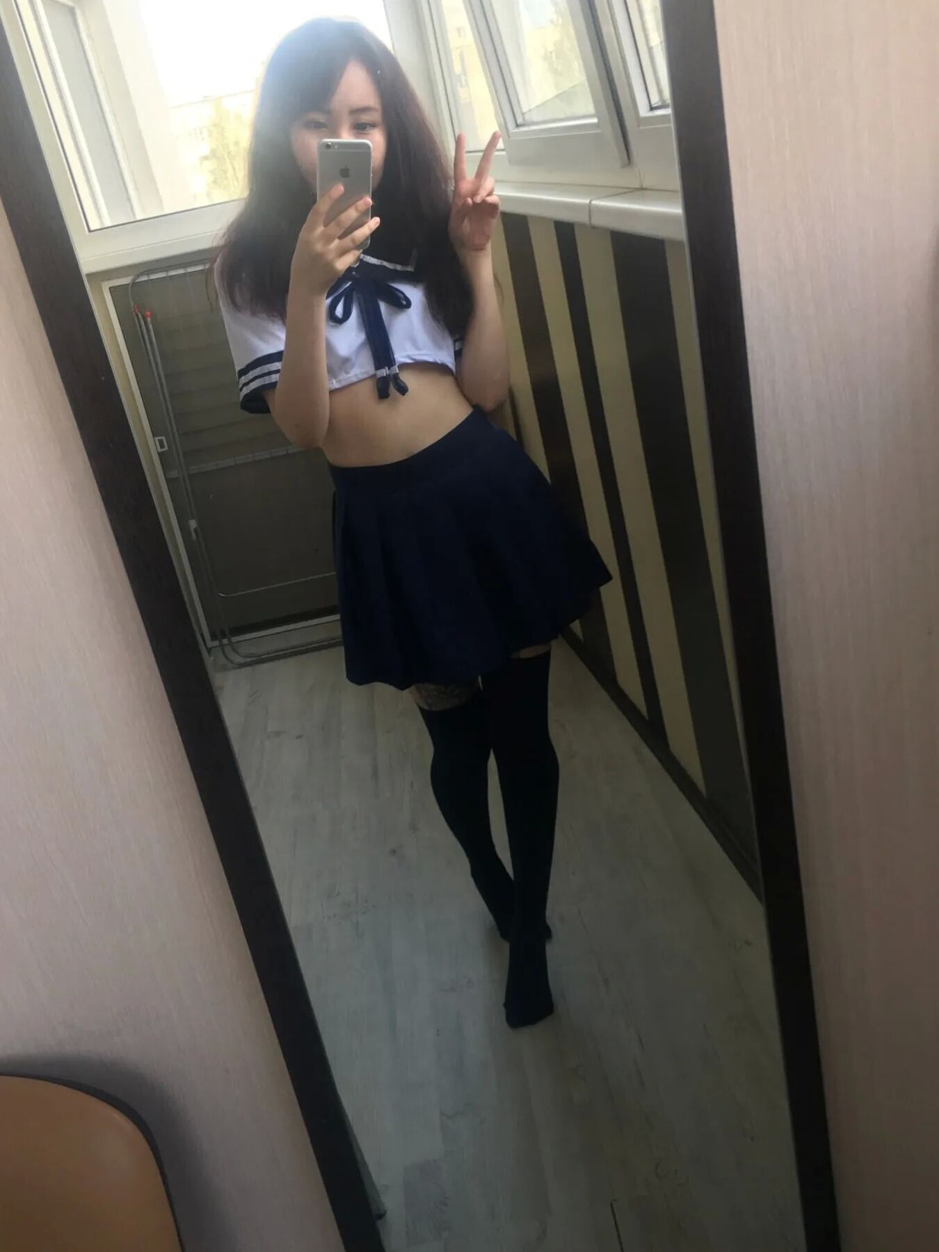 Cute teen babe posing in a hot outfit