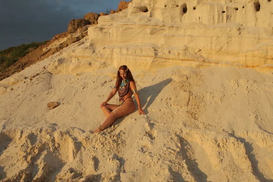 On sunset on pink sand