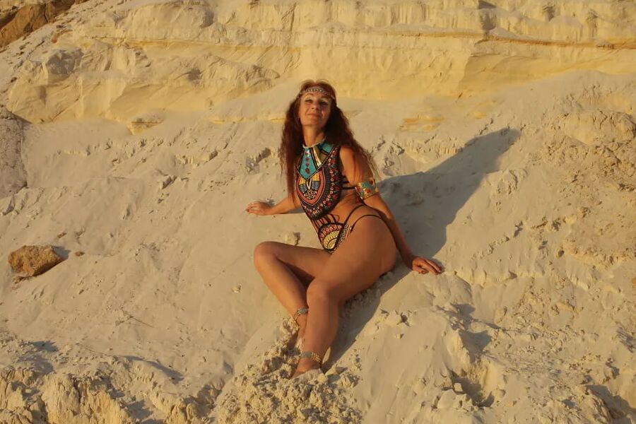 On sunset on pink sand