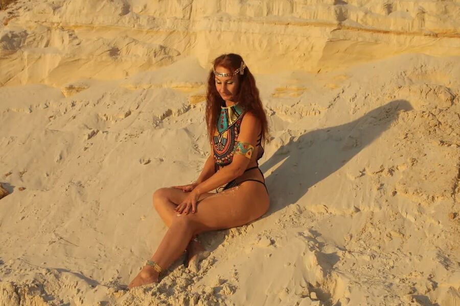 On sunset on pink sand