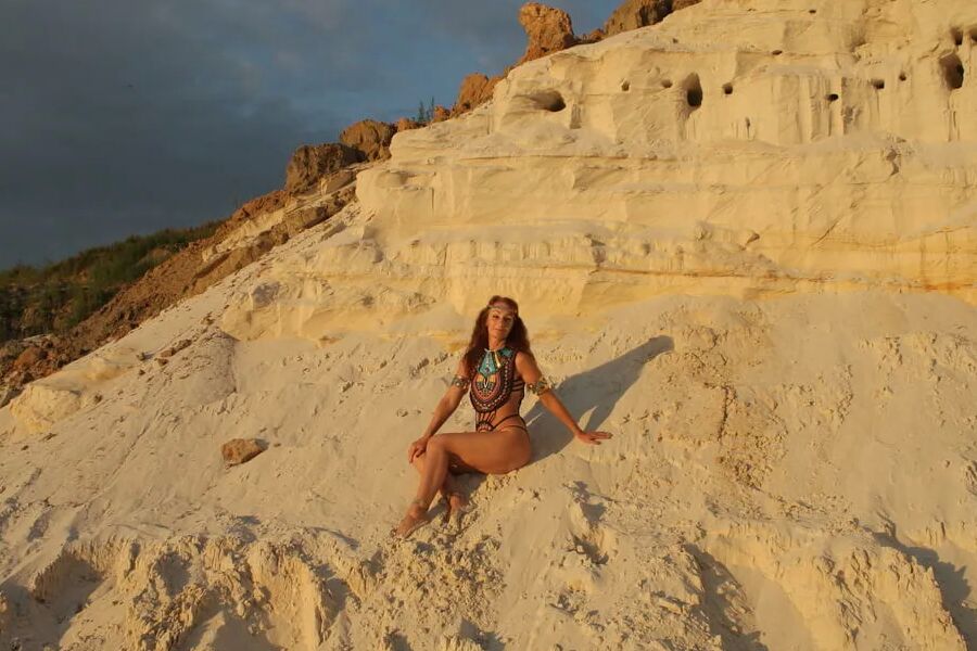 On sunset on pink sand