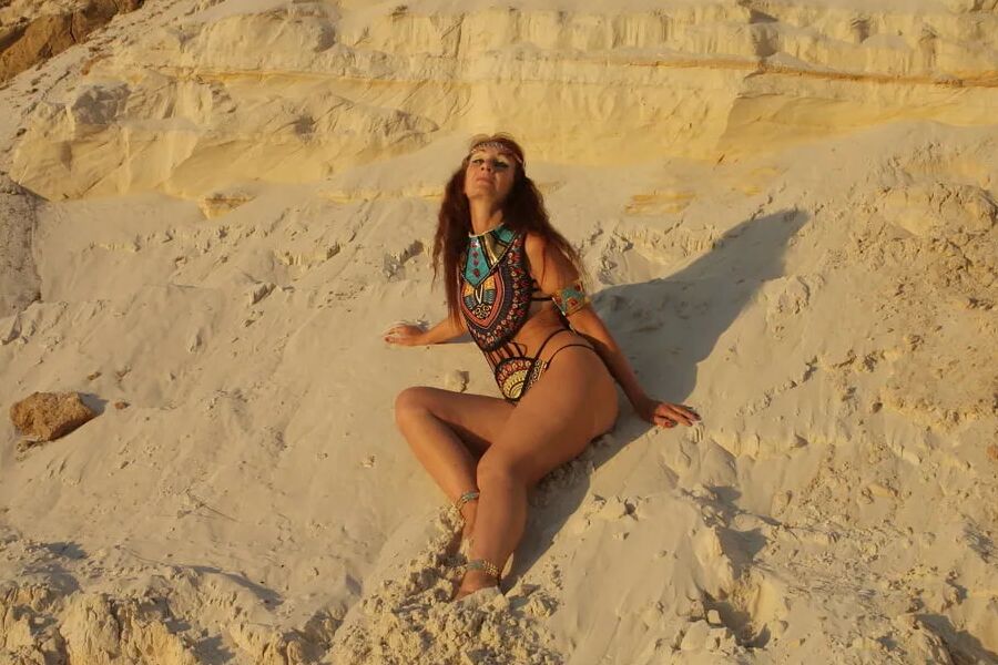 On sunset on pink sand