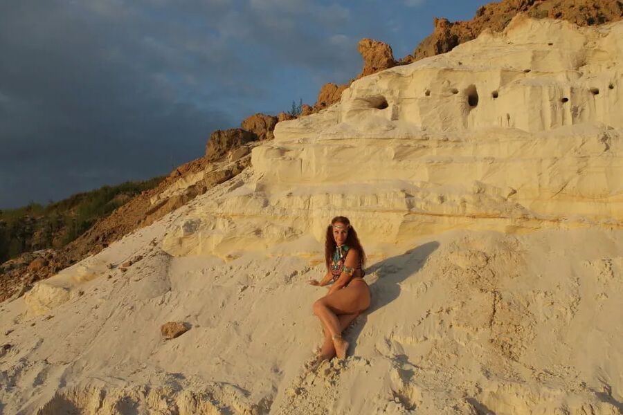 On sunset on pink sand