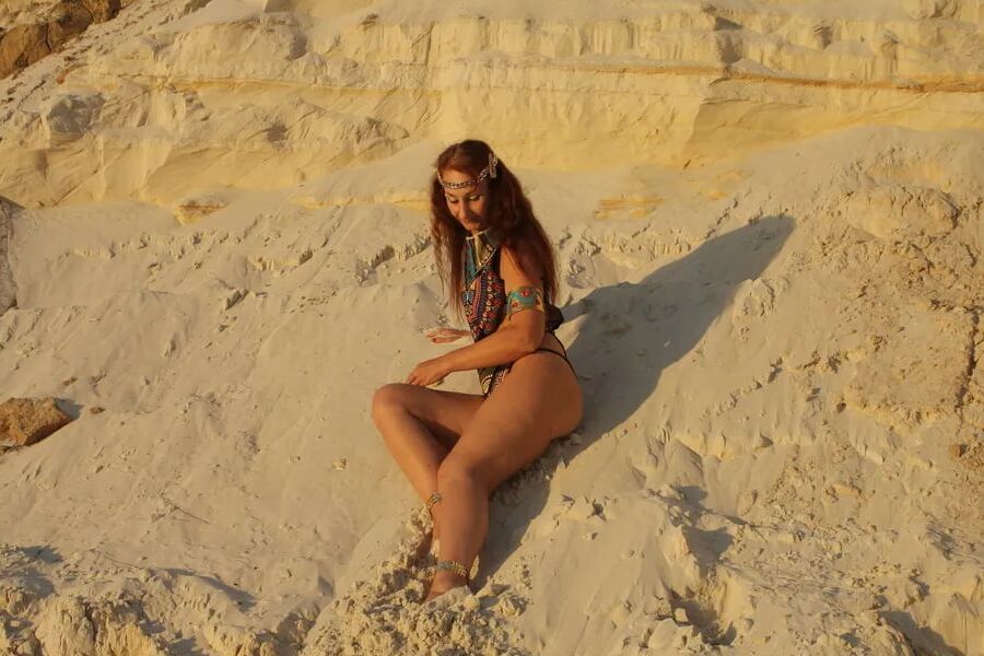 On sunset on pink sand