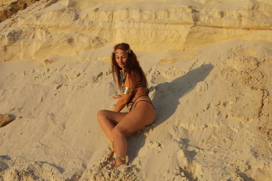 On sunset on pink sand