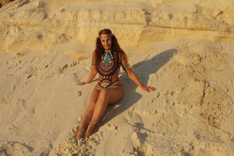 On sunset on pink sand