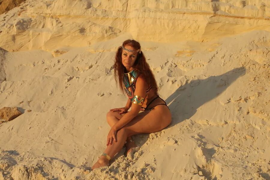On sunset on pink sand
