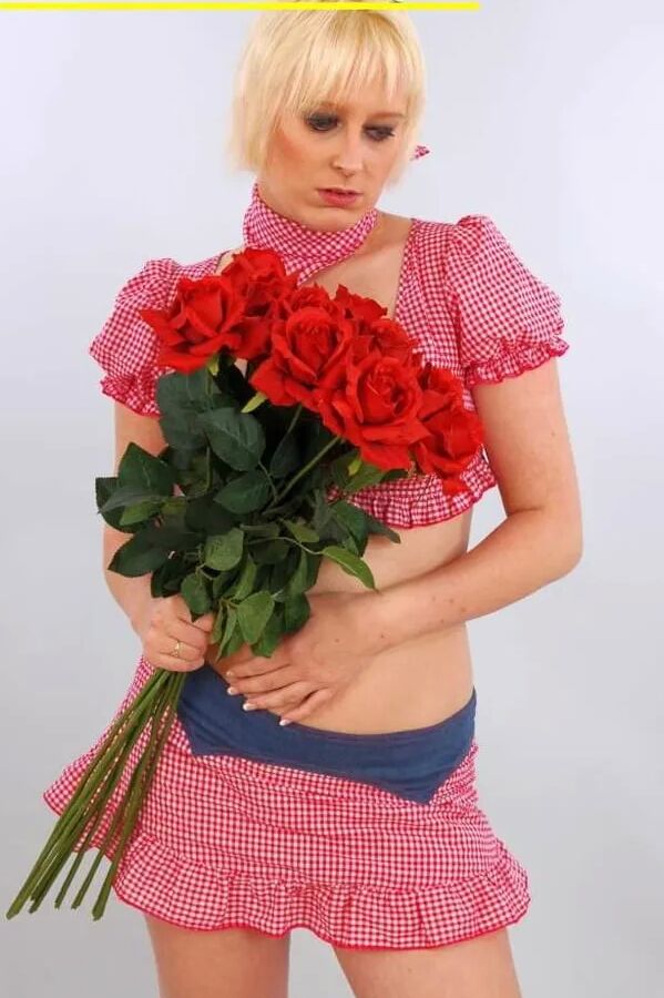 Photo shoot with blonde cum slut Dany Sun in a Bavarian dres