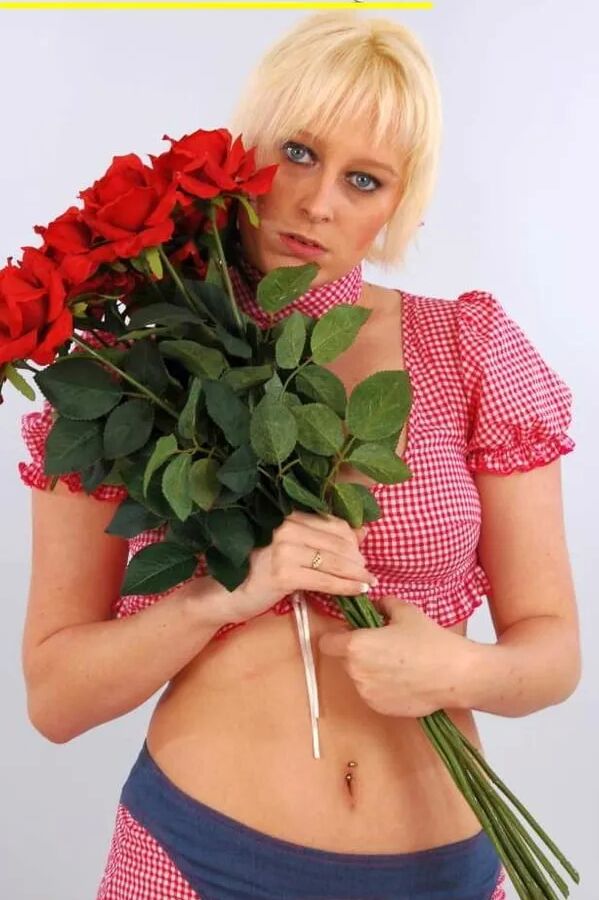 Photo shoot with blonde cum slut Dany Sun in a Bavarian dres