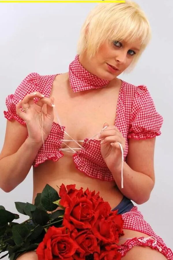 Photo shoot with blonde cum slut Dany Sun in a Bavarian dres