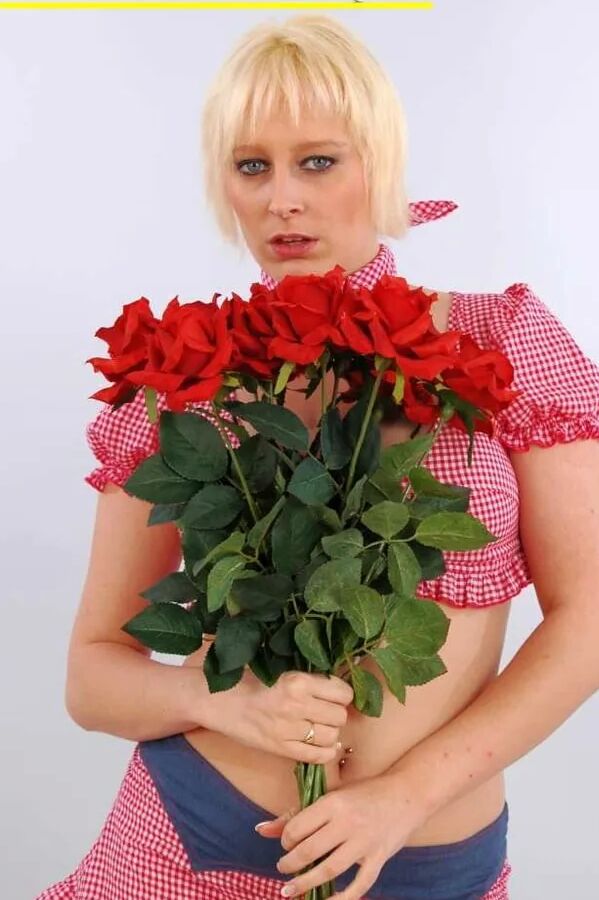 Photo shoot with blonde cum slut Dany Sun in a Bavarian dres