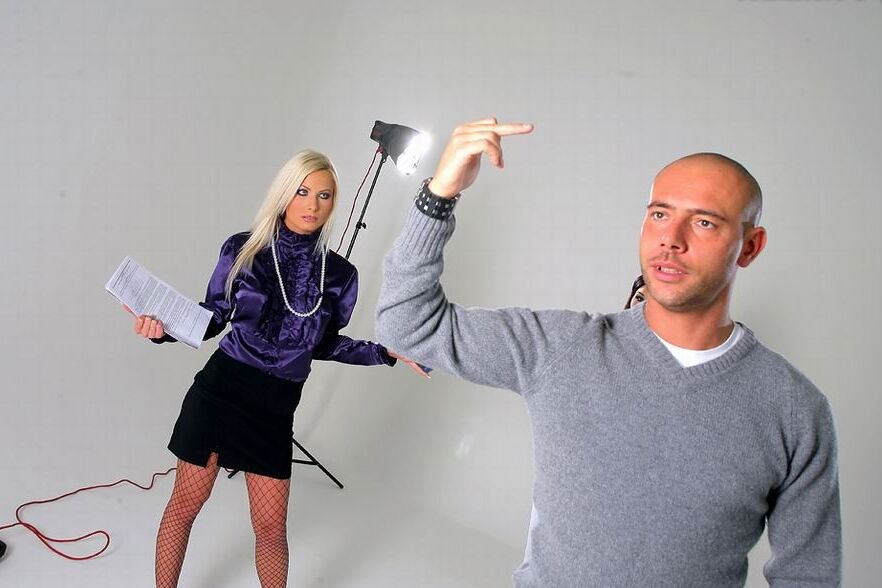 Two dominant stocking lesbs at the photo shooting