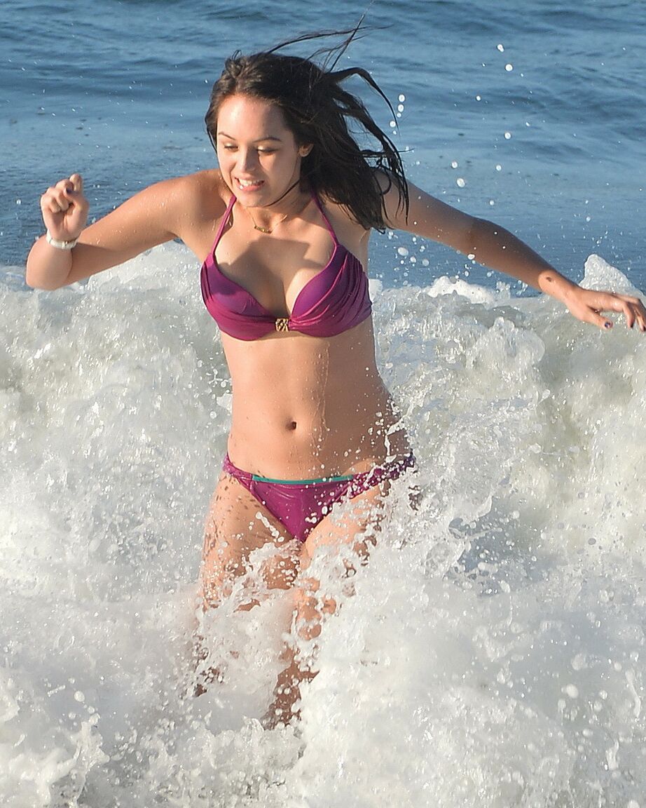 Hayley Orrantia shows off her hot body in a skimpy pink bikini at the beach in L