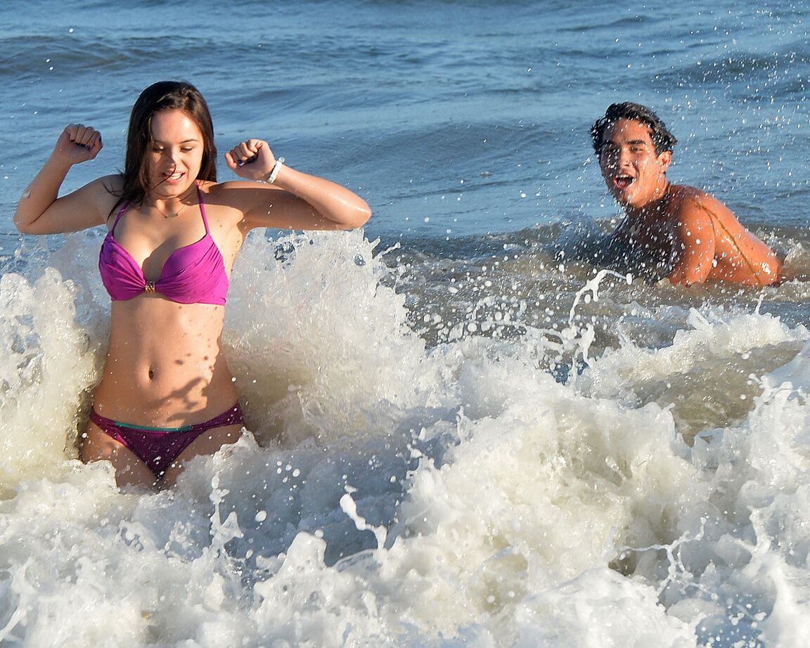 Hayley Orrantia shows off her hot body in a skimpy pink bikini at the beach in L