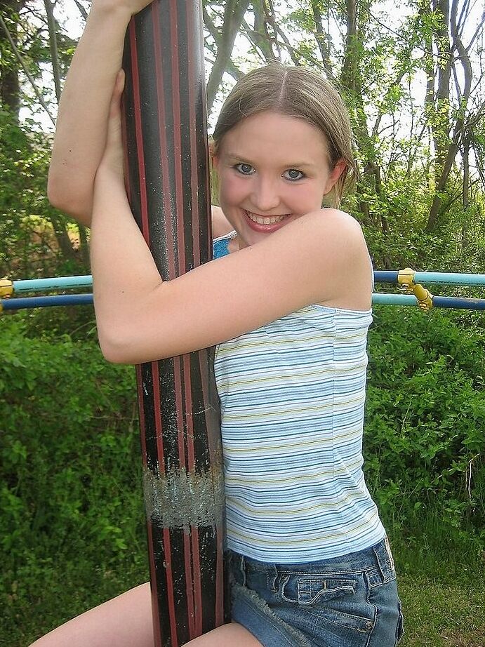 Petite teen flashing her little titties in playground