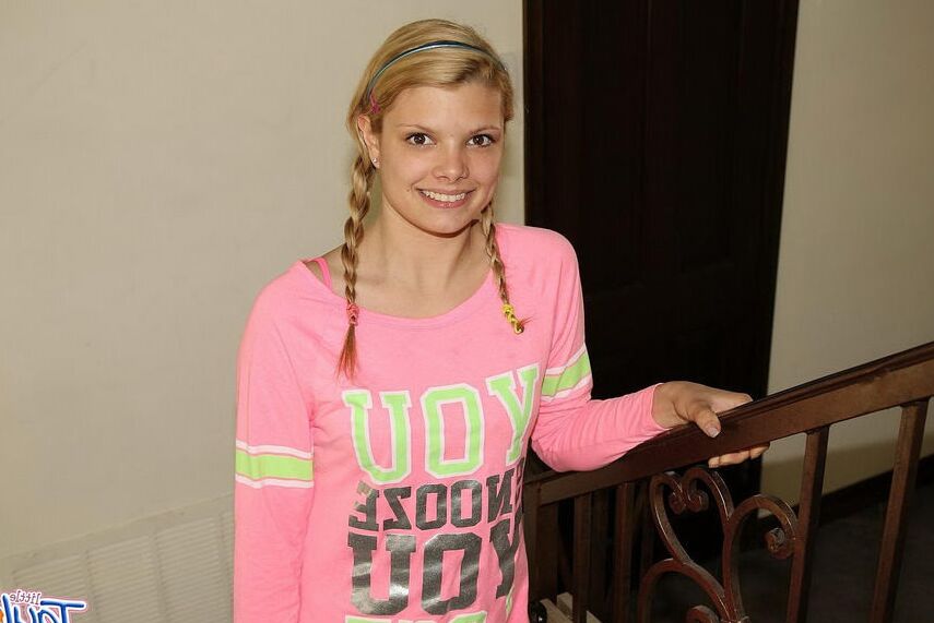 Blonde teen strips and masturbates on the steps