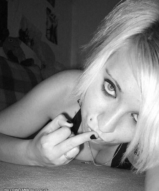 Pictures of a horny blonde emo GF going down on a hard cock