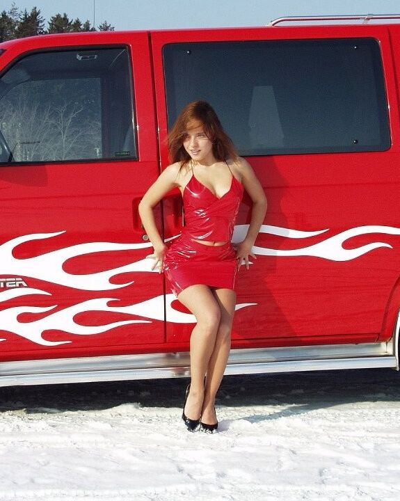 Hot redhead posing and pissing in the snow
