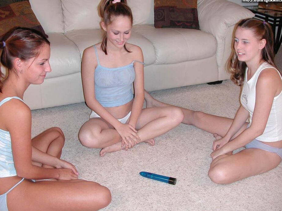 Pictures of three hot teen girls playing spin the dildo