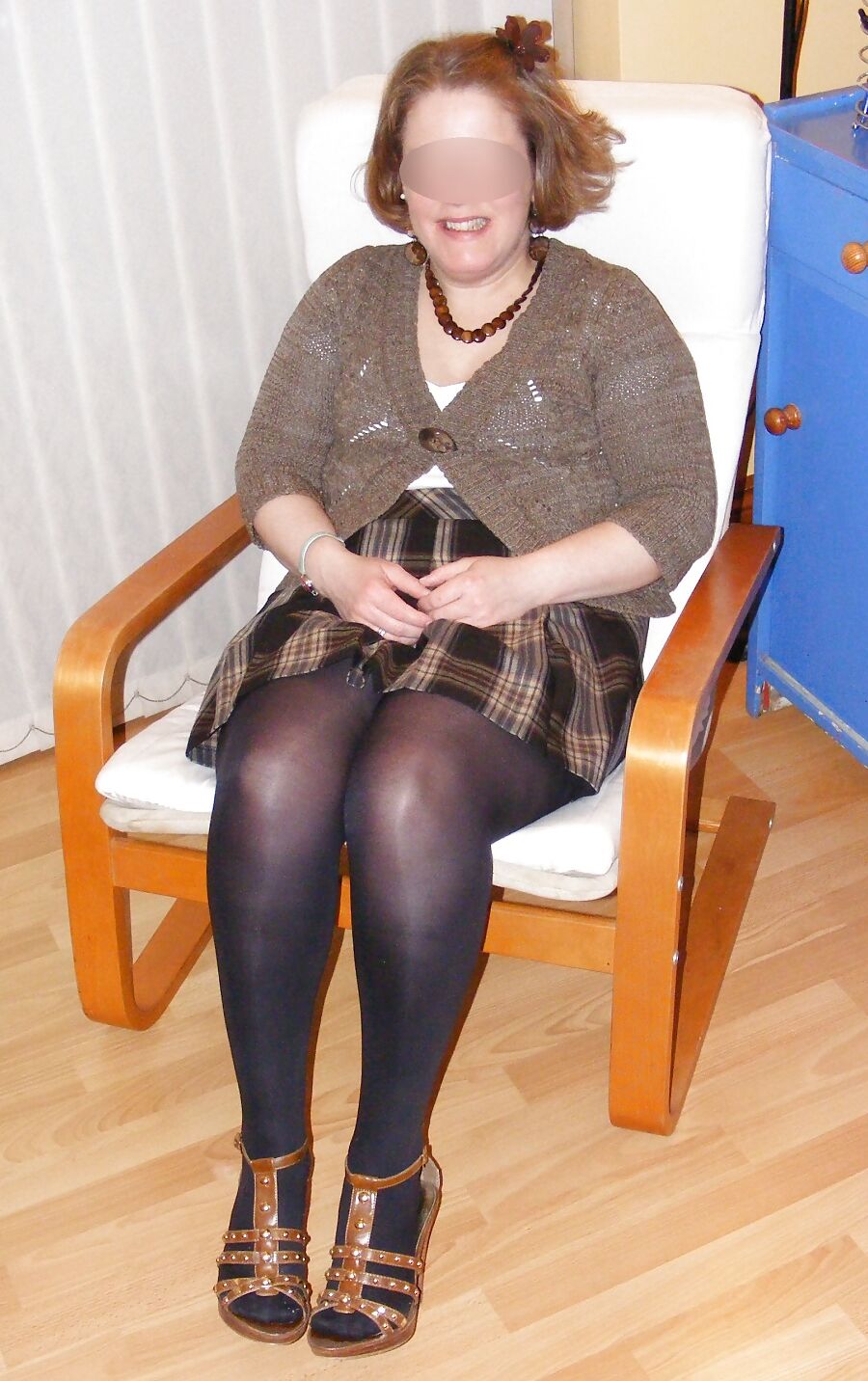 Shiny black tights and lacy white lingerie