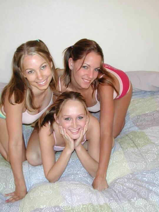 Three teens tweak each other&;s nipples