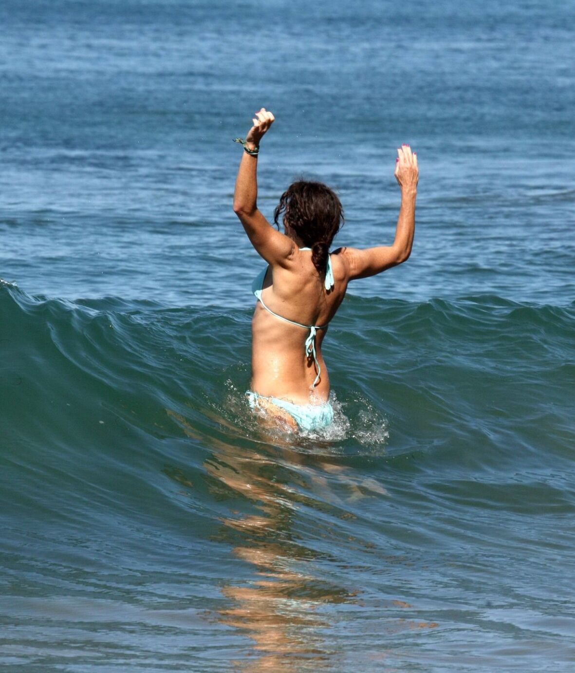 Minnie Driver wearing sky blue bikini on the beach in Malibu