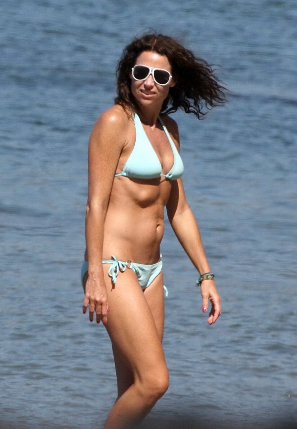 Minnie Driver wearing sky blue bikini on the beach in Malibu